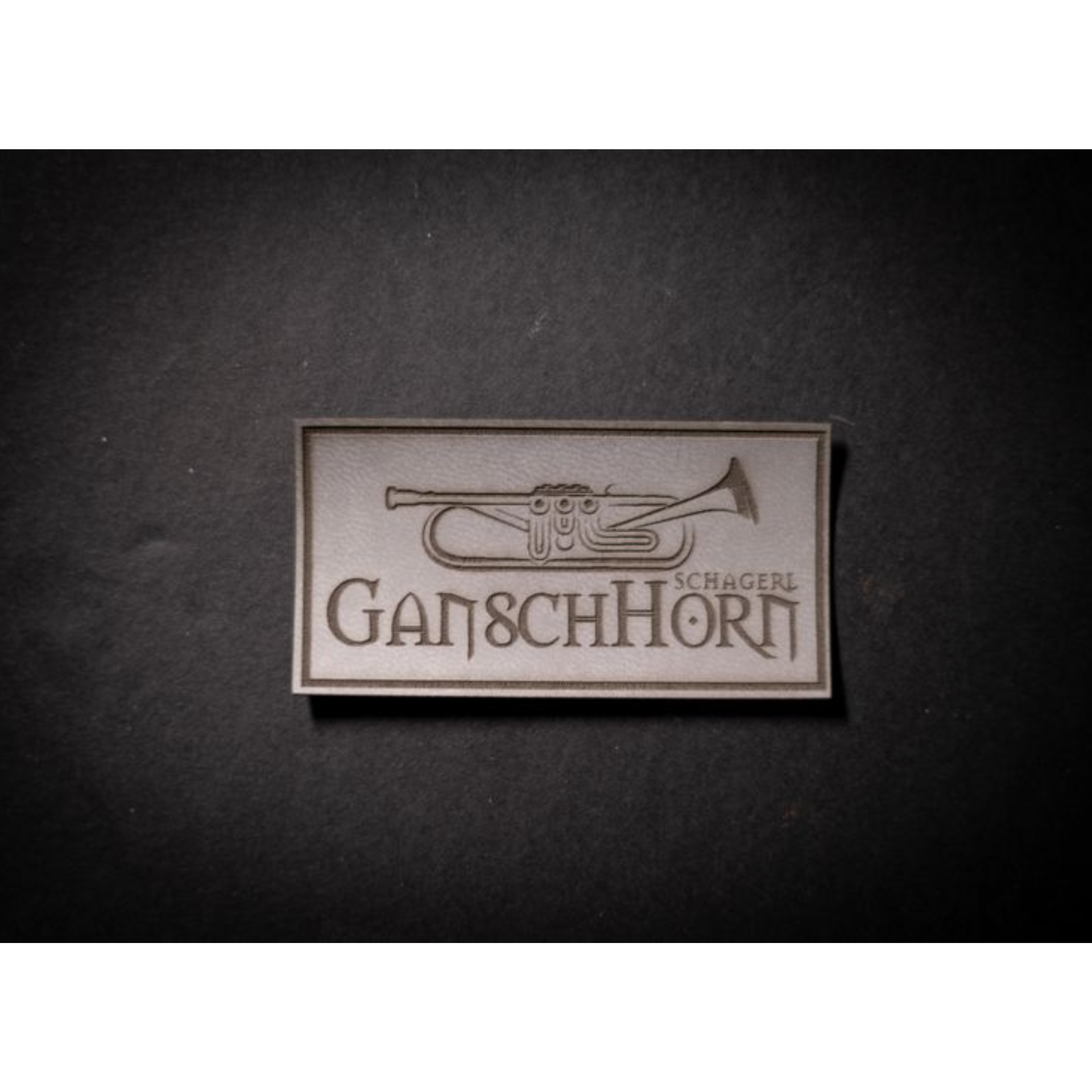 Schagerl Gansch Horn Aufnäher Kunstleder, grau